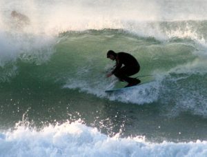 Surfing in Cold Weather Flickr image by Hugh Lunnon