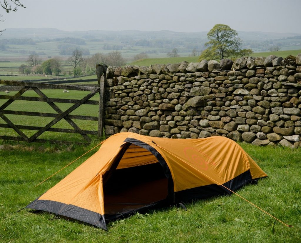 Orange one person tent for hiking by Snugpak