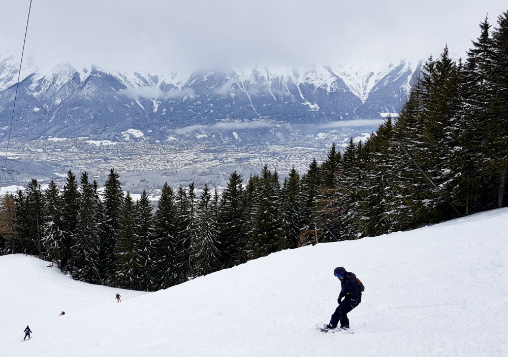 Review of Innsbruck snowboarding in Patscherkofel ski resort view of Innsbruck