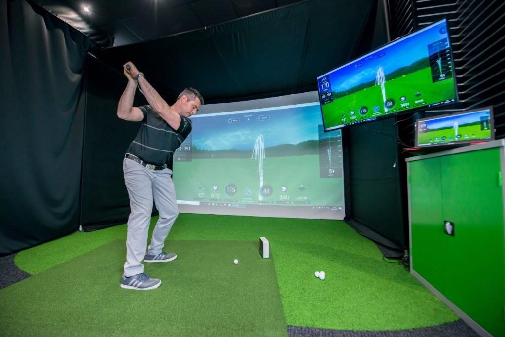 Home golf simulator Google CC image of Skytrak system by Golf Swing Systems Home golf simulator Google CC image of Skytrak system by Golf Swing Systems
