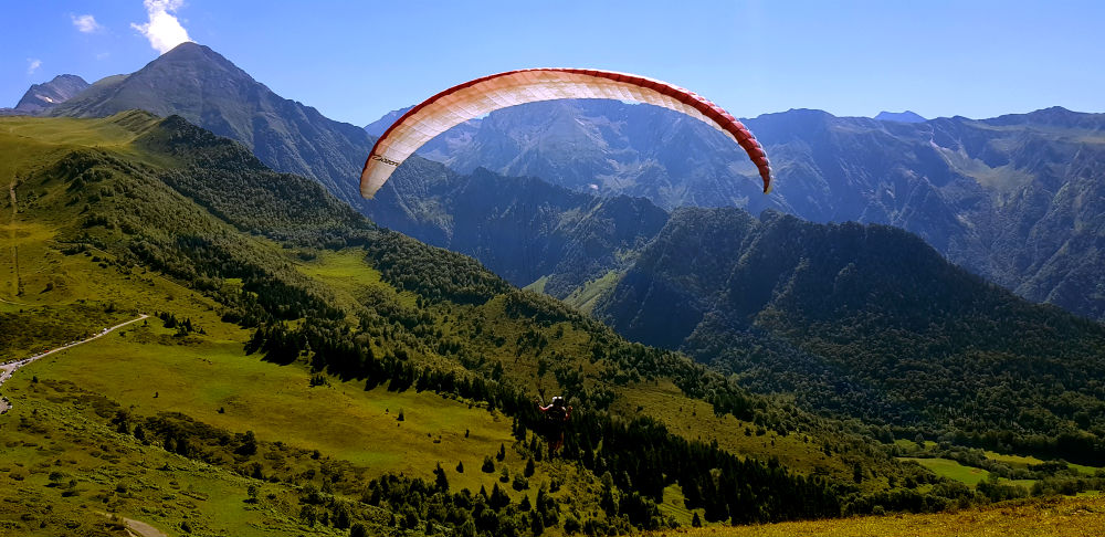 Paragliding in Louron Valley during French Pyrenees Multi activity summer mountain trip