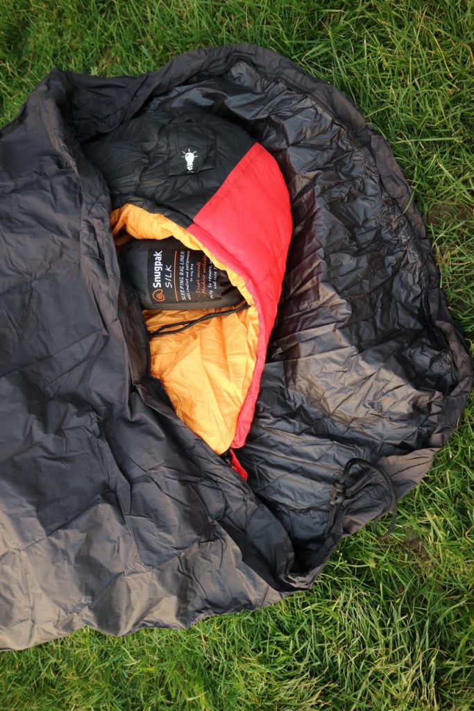 Sleeping bag with bivvi bag over the top