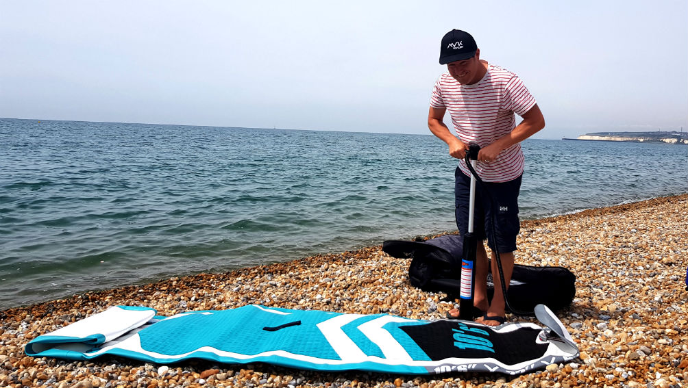 Inflating Goosehill SUP on Seaford Beach sussex UK