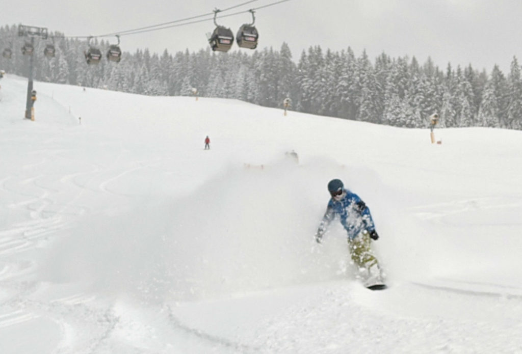 Day 2 first run on snowboarding holiday in Saalbach