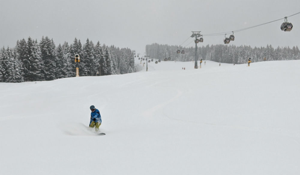 Day 2 first run on snowboarding holiday in Saalbach Austria