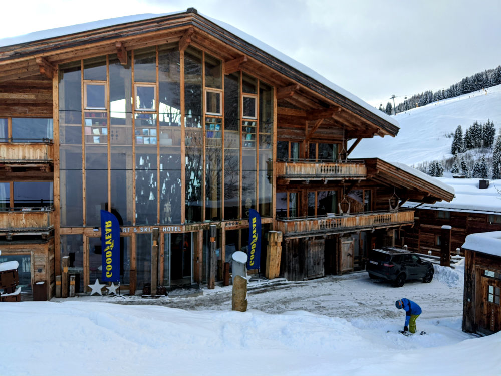snowboarding to the door of Hotel Hinterhag in Saalbach