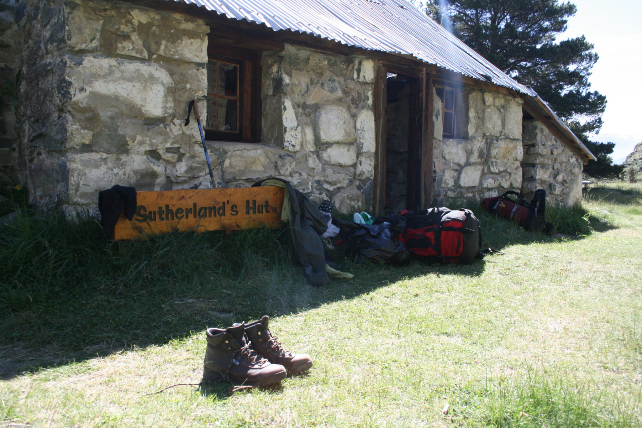 walking boots outside of hut