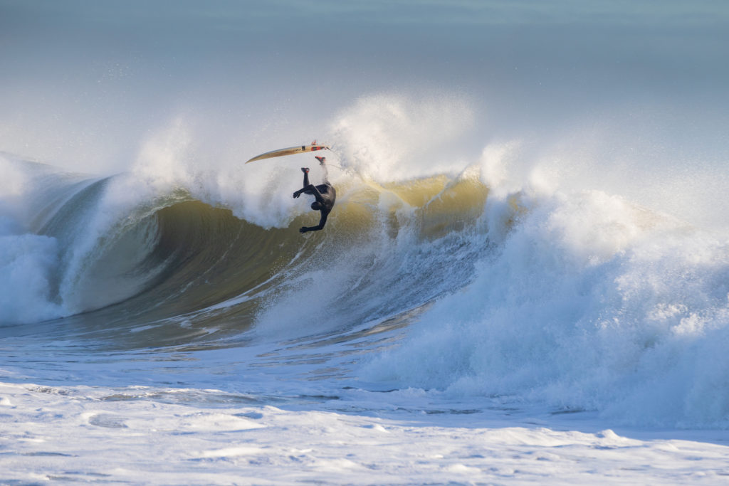 Isle of Wight Surfing holidaysSam Scadgell surfing at Freshwater Bay photo by Jason Swain