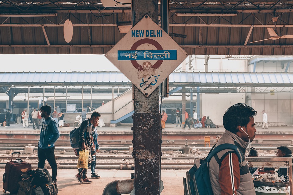 Combat boredom while travelling alone pixabay royalty free image of New Delhi train station