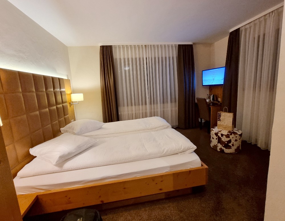 Room in Hotel Olympic in Crans Montana for snowboarding holiday in Switzerland