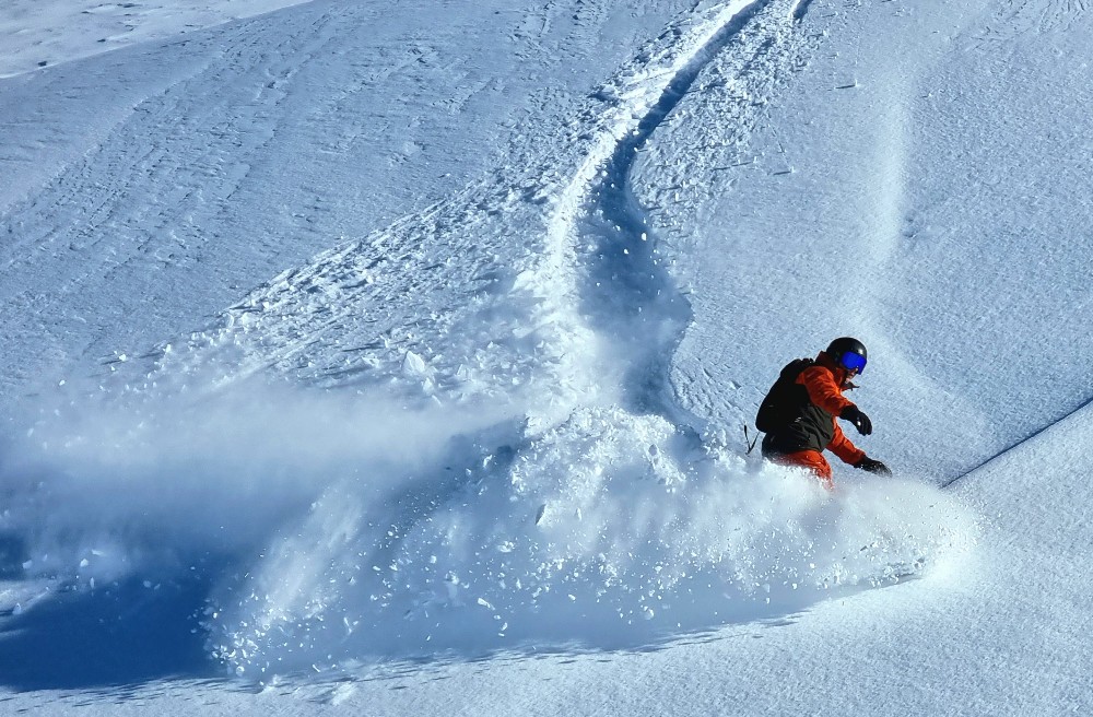 powder during December review of Les Menuires snowboard holiday in the French Alps