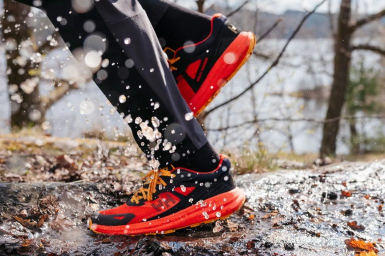 Running through water in Helly Hansen Skyhawk trail shoes