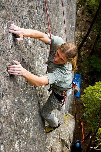 Man Rock Climbing